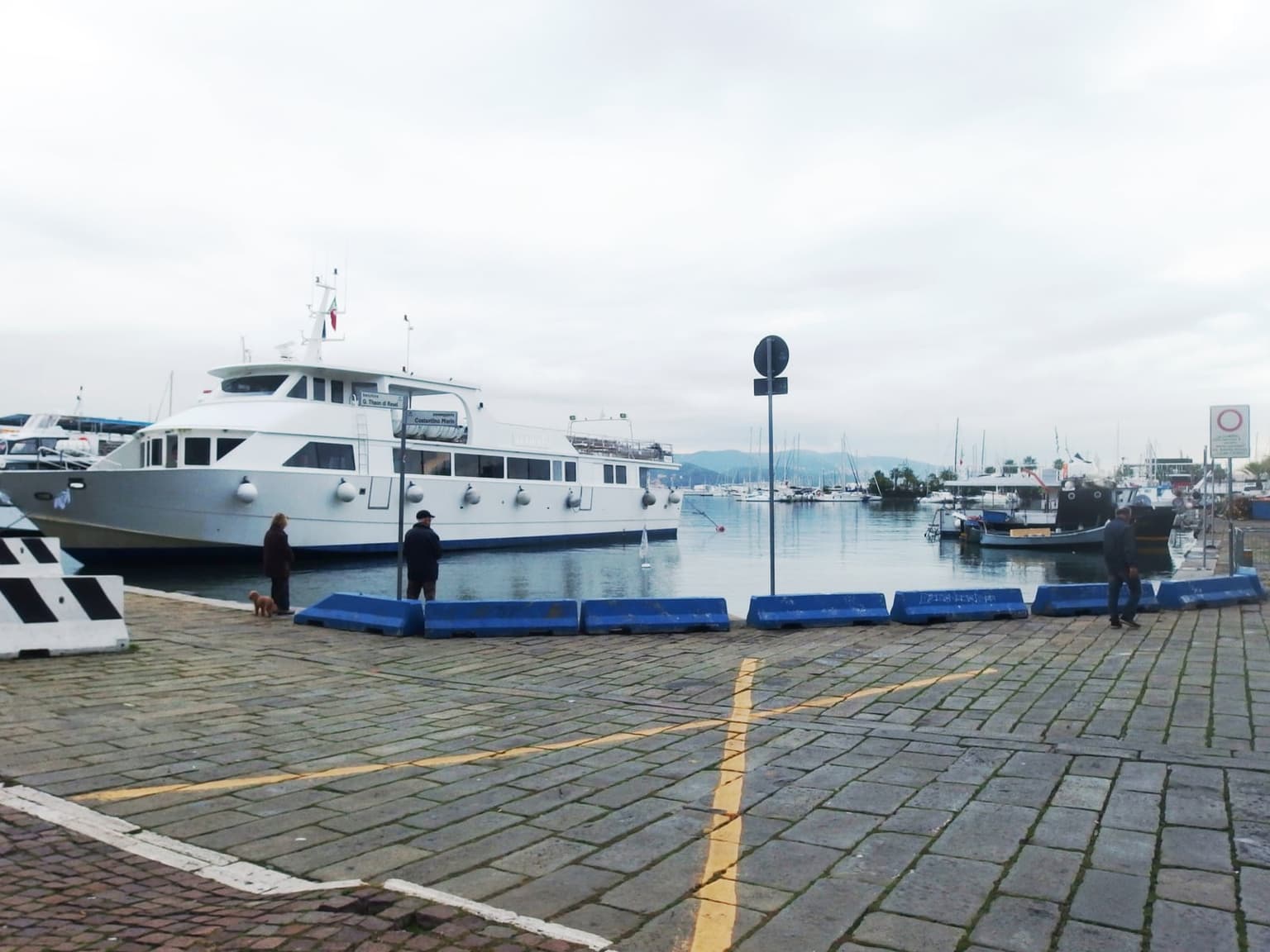 A passenger boat moored at the pier on Passeggiata Morin, La Spezia's Golfo dei Poeti ferry quay.