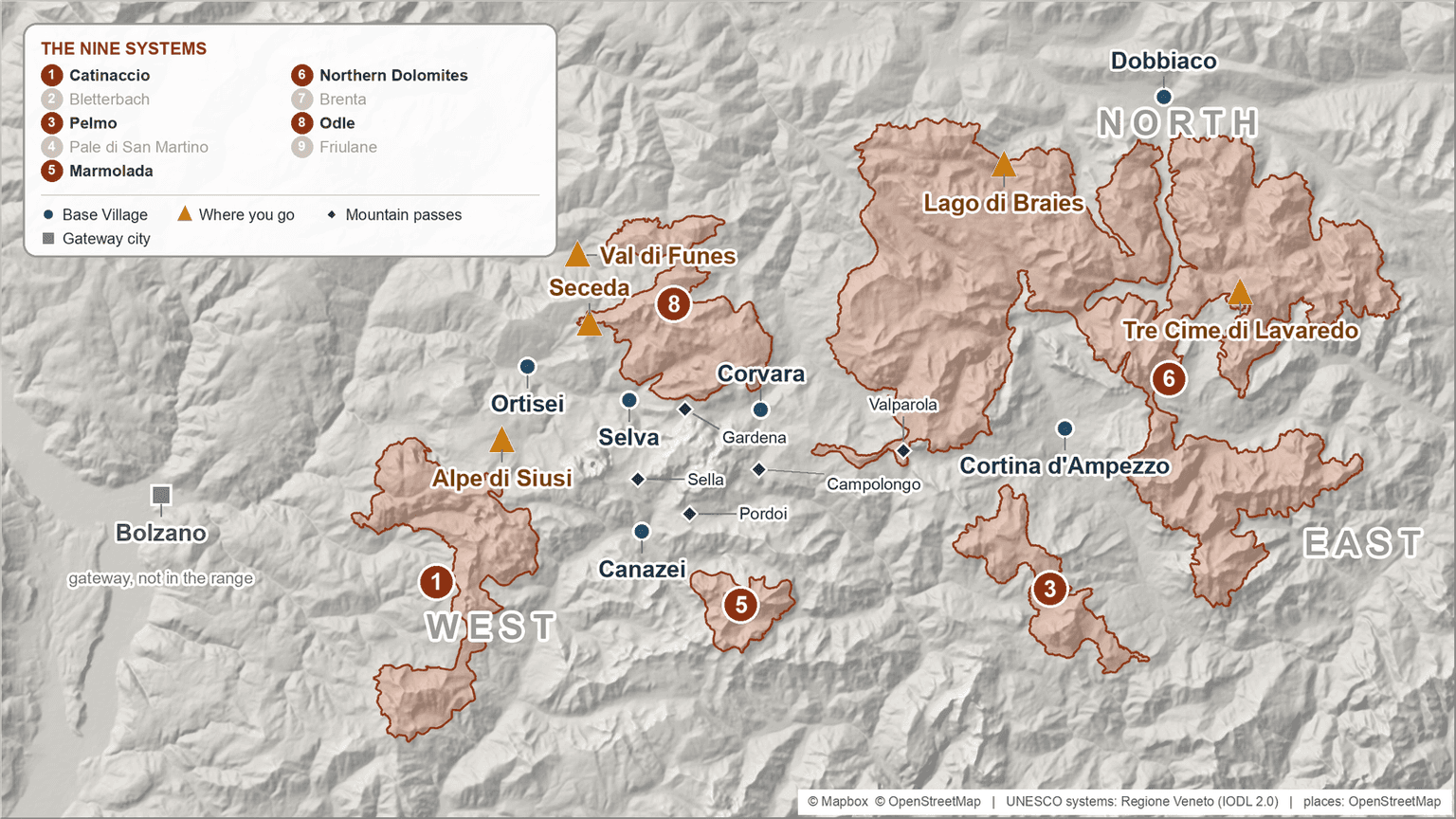 Shaded relief map of the Dolomites with the mountain systems outlined and numbered, the base villages and the marquee sights marked with separate symbols, the five main passes named, and the gateway city of Bolzano marked outside the range