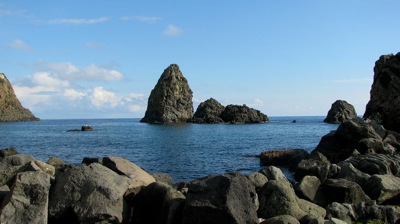 The basalt sea stacks off Aci Trezza, near Catania