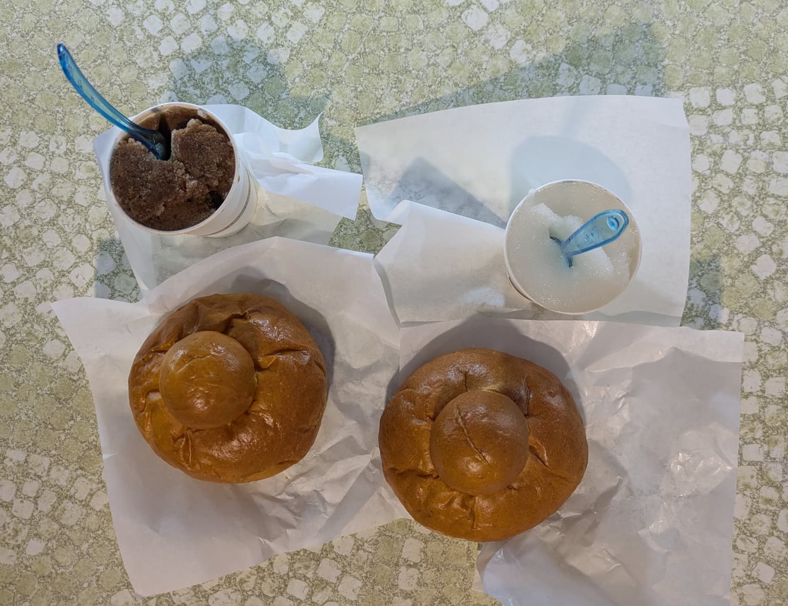 Coffee and lemon granita served with a brioche bun, the traditional Sicilian breakfast
